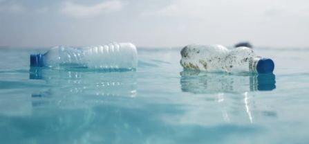 2 plastic bottles in the ocean